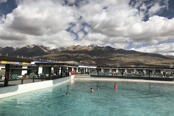 10 Days Tibet Everest Base Camp and Namtso Small Group Tour - Road days to Shigatse and Gyantse: passes, a glacier roadside moment (Day 4)