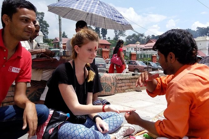 Kathmandu Spiritual Sites: Bodhnath & Pashupatinath Tour - The Shift Between Religions: From Wheels and Lamps to Shiva Stories
