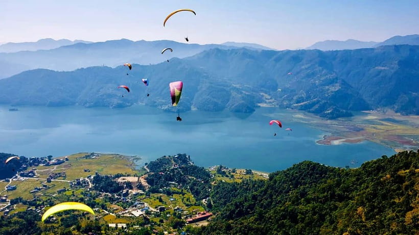 Pokhara: Half Day Upper Seti Rafting & Paragliding adventure - How the crew handles the fun: breaks, swimming, and those welcome spills