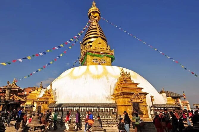 Private Full-Day Kathmandu All 7 UNESCO World Heritage Sites Tour - Boudhanath Stupa: the huge white dome and slower spiritual energy