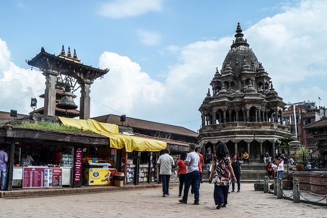 Temples and Stupas Tour in Kathmandu Valley - Stop 3: Boudhanath Stupa and cross-religious respect